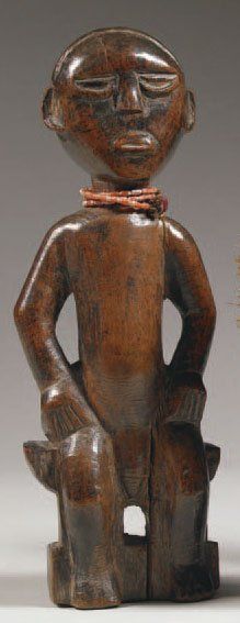 null AKAN. (Ghana / Côte-d'Ivoire) Bois. h. : 27 cm Charmante statuette figurant...