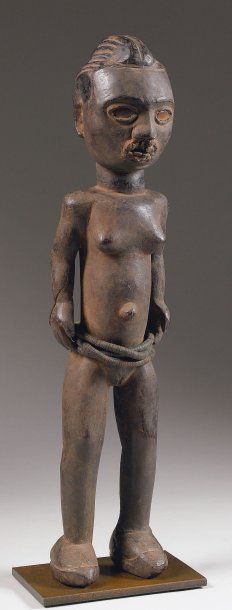 null TIV. (Nigeria) Bois. h. : 56 cm Ancienne sculpture ihambe figurant une femme...