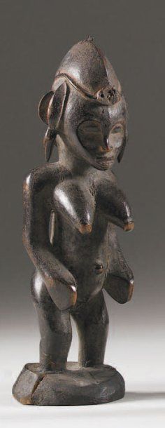 null SÉNOUFO. (Côte-d'Ivoire) Bois. h.: 22 cm Ravissante petite statuette féminine...