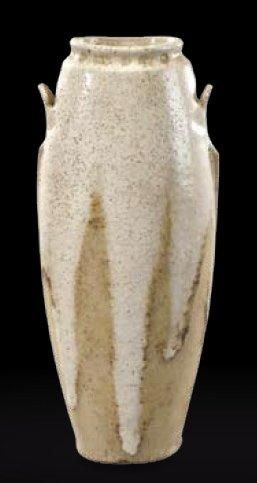 ÉMILE DECOEUR (1876-1953) Vase ovoïde à corps en léger méplat présentant des ailettes...