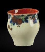 Albert Damouse (1848-1926) Petit vase en céramique émaillée à décor à motifs floraux...