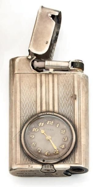 ETERNA Circa 1940 Rare briquet en argent à Essence équipé d'une montre. Cadran argent,...