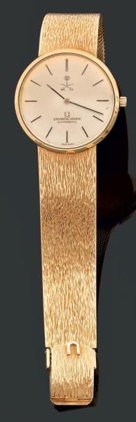 UNIVERSAL GENEVE Circa 1960 Montre-bracelet tour de bras tout or 18K, Cadran argenté...