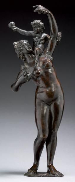 null Statuette en bronze ciselé et patiné, figurant une bacchanale et un jeune satyre,...