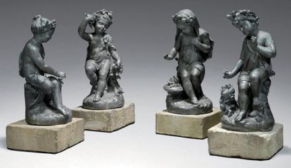 null Suite de quatre statuettes en plomb représentant des enfants symbolisant chacun...