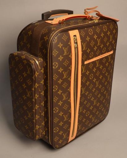 LOUIS VUITTON Valise trolley en Toile Monogram Parements et poignée en cuir naturel...