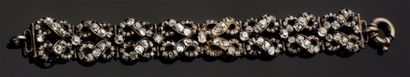 null Bracelet articulé en or gris 14 carats et argent entièrement serti de diamants...