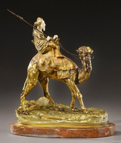 MARQUET «Méhariste» Epreuve chryséléphantine en bronze à patine dorée et ivoire figurant...