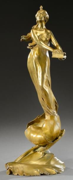 MauRicE BOuVal (1863-1916) Sculpture en bronze doré figurant une femme au coffret...