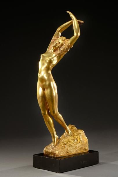 MARCEL BOURAINE (1886-1948) Epreuve en bronze à patine dorée figurant une femme nue...