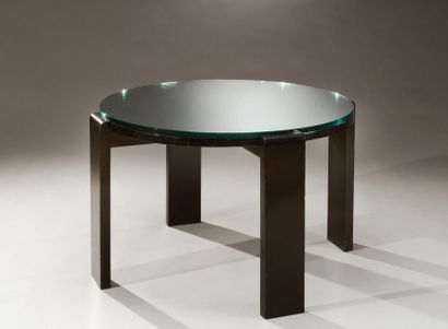 JACQUES ADNET (1900-1984) Table basse à plateau circulaire en miroir reposant sur...