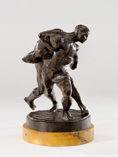 EUGENE D. PIRON (1875-1928) Epreuve en bronze à patine brune figurant des lutteurs....