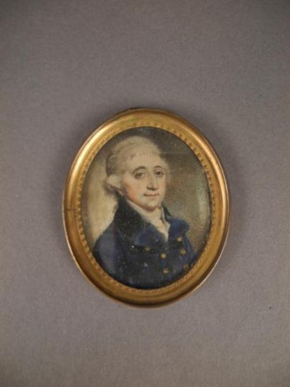 ECOLE FRANCAISE DU XIXème siècle Portrait d'homme à la redingote bleue Miniature...