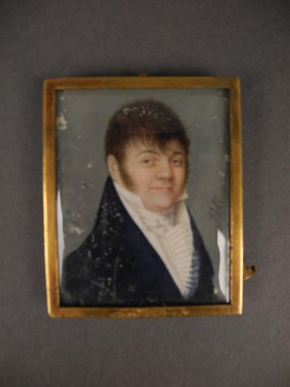 ECOLE FRANCAISE DU XIXème siècle Portrait d'homme à la redingote bleue Miniature...