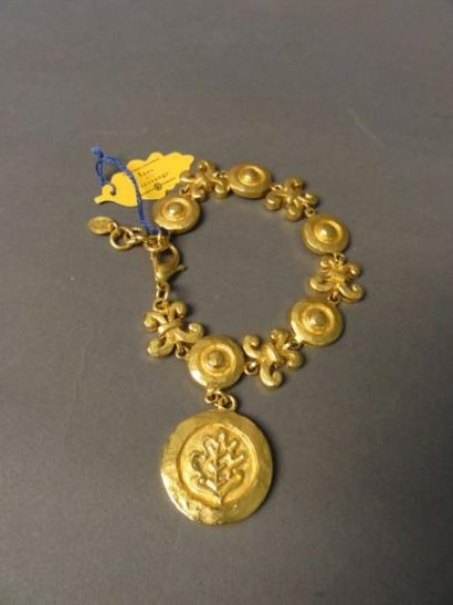 Inès de LA FRESSANGE Bracelet "Médaillons" en métal doré Signé