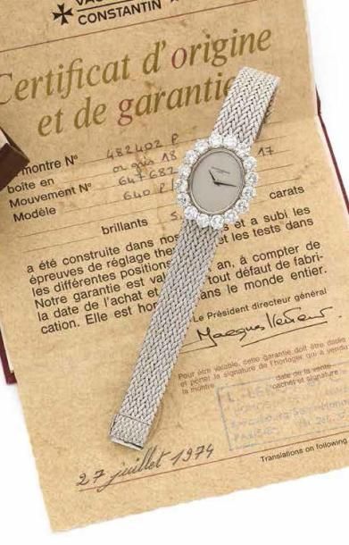 VACHERON CONSTANTIN Vers 1960 Modèle de dame ovale joaillerie tout or gris. Cadran...