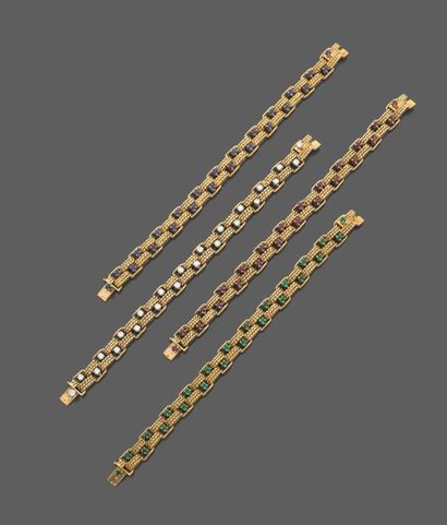 BOUCHERON Bracelets articulés en or jaune et platine composé de deux lignes de maillons...