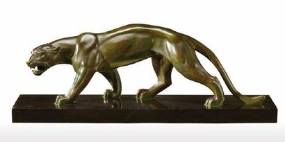 C.ANDREA (XXème) Epreuve en bronze à patine brune nuancée verte figurant une panthère...
