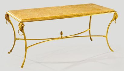 MAURICE RINCK, attribué à Table basse en bronze doré à plateau rectangulaire en marbre...
