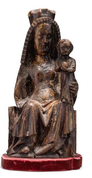null Vierge à l'Enfant en bois sculpté. Europe Centrale, XVème siècle H: 31 cm -...