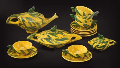 Raoul LACHENAL (1885-1956) Service à thé en céramique émaillée jaune à motifs floraux...
