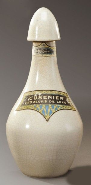 RAOUL LACHENAL (1885-1956) Pour CUSENIER Bouteille à liqueur à panse ovoïde en céramique...