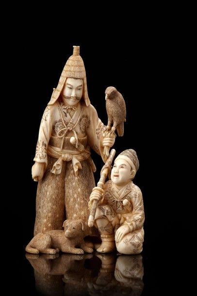 JAPON Okimono en ivoire sculpté représentant un samouraï et son servant à genou,...