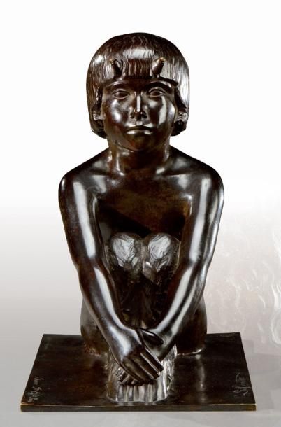 Paul SILVESTRE (1884-1976) Epreuve en bronze à patine noire figurant un faune assis....