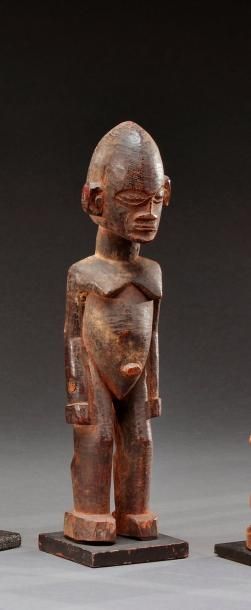 null Statuette Lobi du Burkina Faso montrant un personnage debout les bras plaqués...