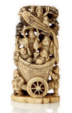 JAPON Okimono en ivoire dieux du bonheur dans un chariot de matsuri, tiré et poussé...