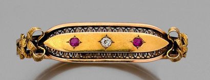 null Bracelet jonc en or jaune et rose 18k composé d'un motif central serti de rubis...