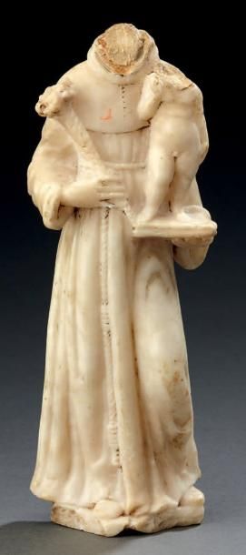 null Sculpture en albâtre représentant un saint personnage portant une statue du...