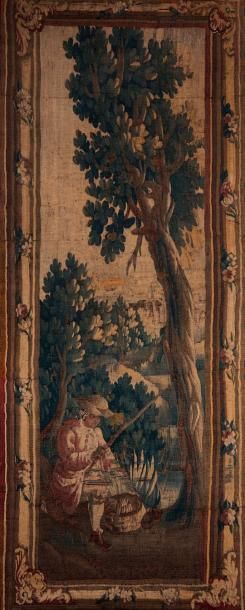 AUBUSSON Panneau en tapisserie représentant le repos du chasseur; bordure à joncs...