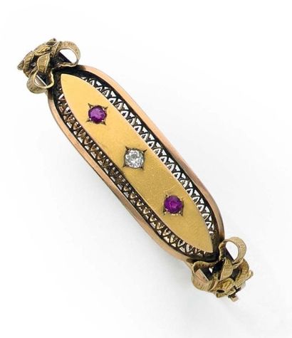 null Bracelet jonc en or jaune et rose 18k composé d'un motif central serti de rubis...
