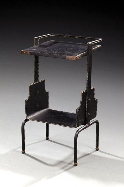 JACQUES ADNET (1900-1984) Table de fumeur à deux plateaux rectangulaires superposés...