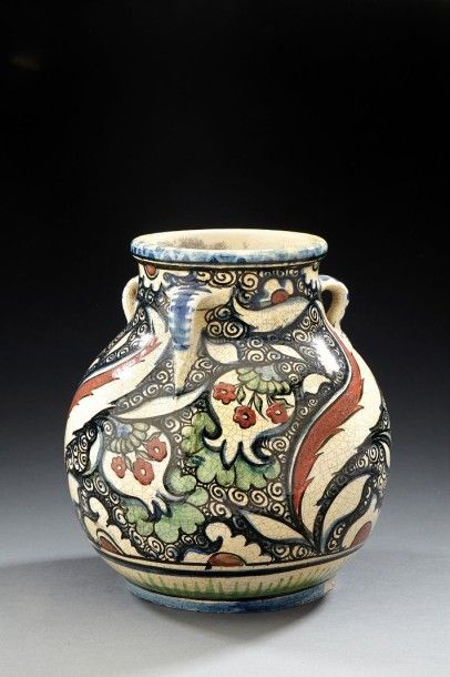 Raoul LACHENAL (1885-1956) Vase à corps ovoïde et col resserré évasé à trois anses...