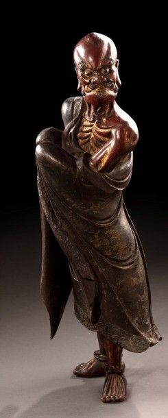 CHINE Grande figurine ancienne en bois sculpté, laquée rouge, or et brun représentant...