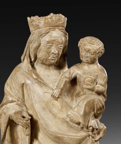 null VIERGE A L'ENFANT
en pierre calcaire, la vierge debout tient l'enfant sur son...