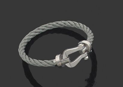 FRED "Force 10" Bracelet "cable" en acier et or gris. Signé et numéroté. Pochette...