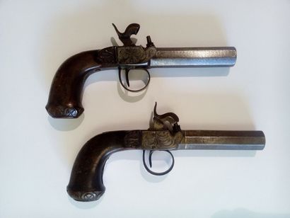 null Paire de pistolets à canons damas à balles forcées. XIXe siècle