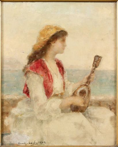 École orientaliste du XXE Jeune femme à la guitare Huile sur toile, signée et datée...
