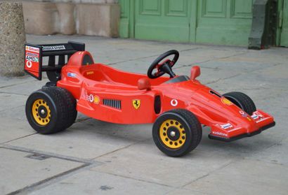 null Voiture à pédales 
de marque Fischer Price, de type Ferrari Formule 1 année...