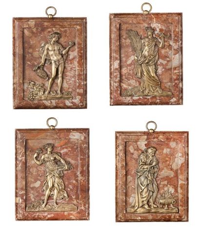 null Rare suite de quatre bas relief en bronze ciselé et doré représentant les quatre...