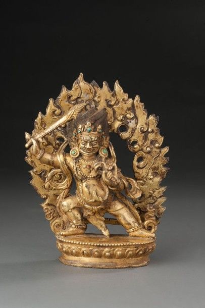 ART SINO TIBETAIN Mahakala Béhairava en bronze doré tenant un sabre enflammé dans...