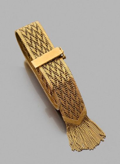 null Bracelet "ceinture" en or jaune 18k tressé.
Poids brut: 52,5g