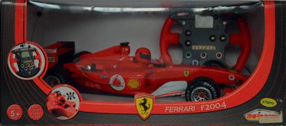 null Ferrari F1 2004 échelle 1/12ème, à moteur électrique, radiocommandée, par MAJORETTE...
