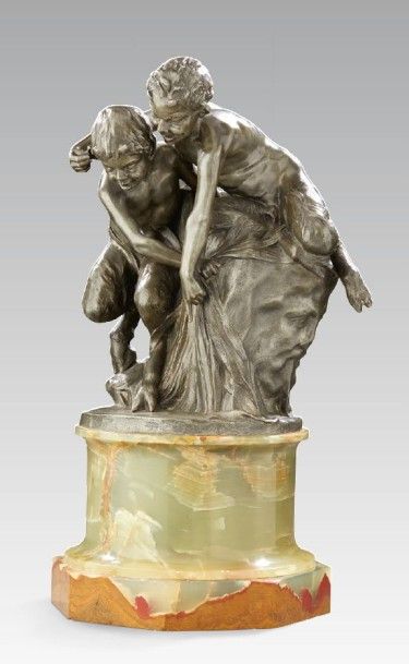 Raoul LARCHE (1860-1912) Sculpture en étain figurant deux faunes reposant sur une...