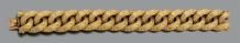 null Bracelet articulé en or jaune 18k ciselé.
Long: 17 cm
Pb: 57.4 gr