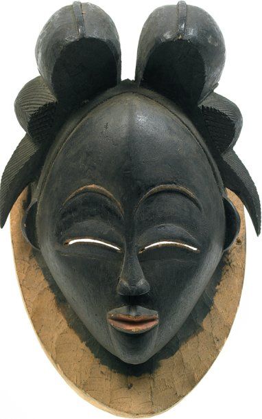 null Punu. (Gabon) Bois. H.: 31 cm Beau masque classique de type « mukuyi » présentant...