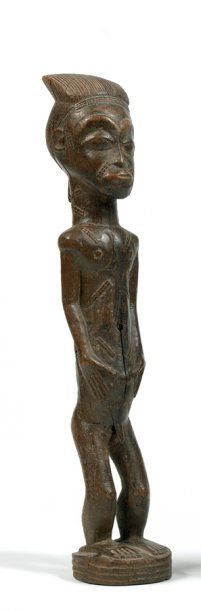 null Baoulé. (Côte-d'Ivoire) Bois. H.: 40 cm Statuette masculine debout, figurant...